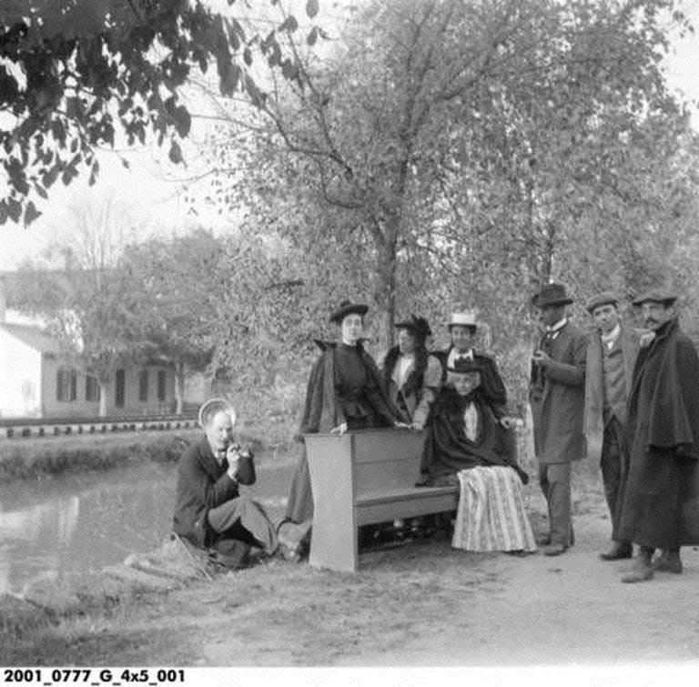 T.C. Steele: third from right holding pipe, J. Ottis Adams: sitting on canal bank